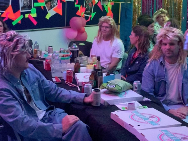 a photo of people enjoying Game Show Trivia with Chris Falcon Hill